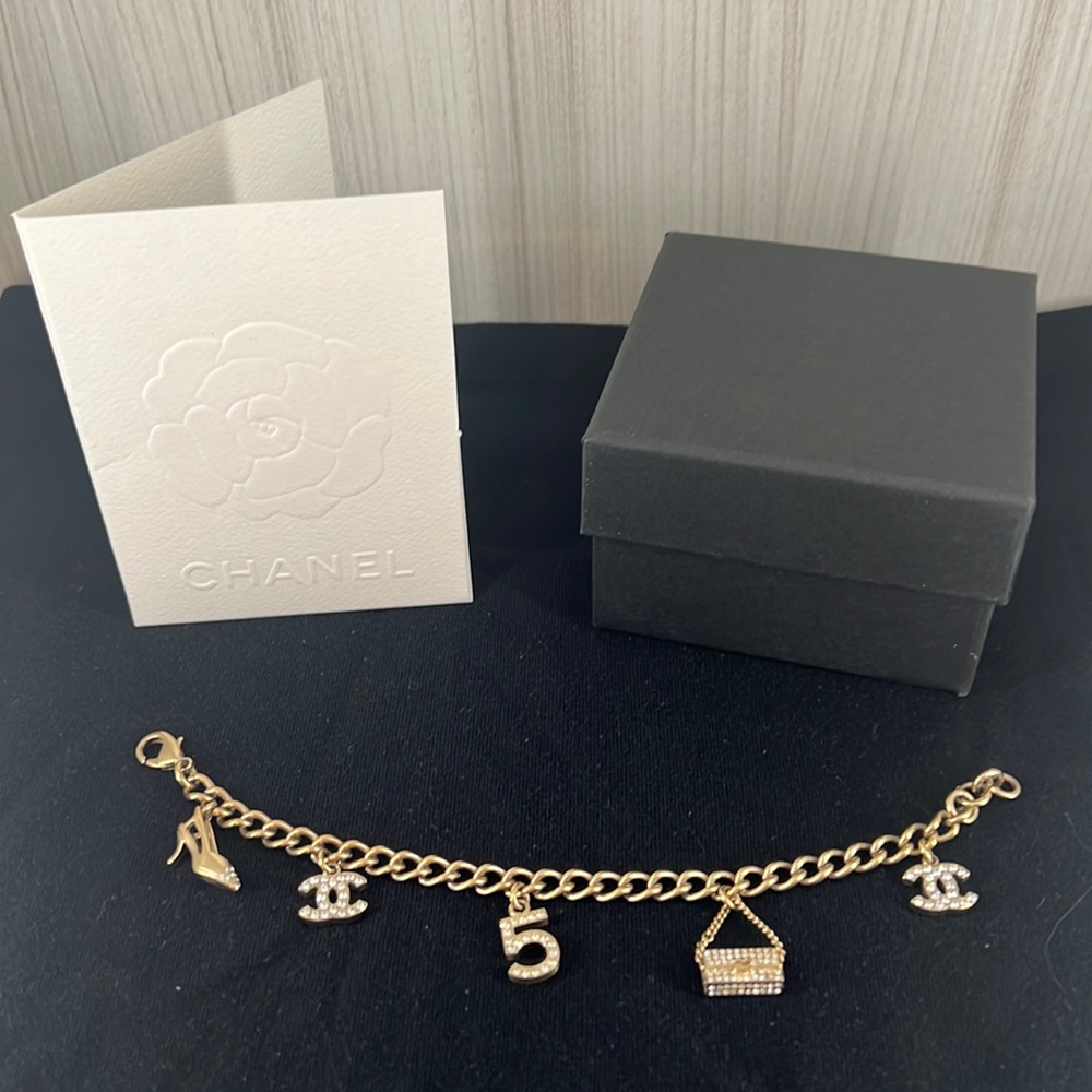Authentic vintage Chanel gold charm bracelet